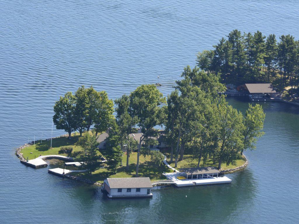 Back side of Belle Island with dock and boat house