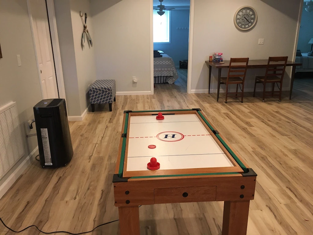 Mini conversion table with air hockey and pool